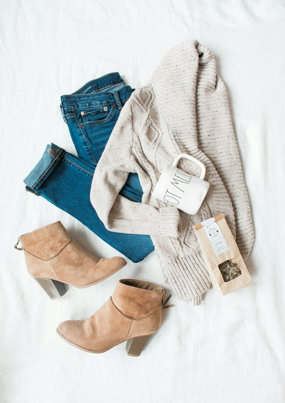 Knit sweater styled with denim