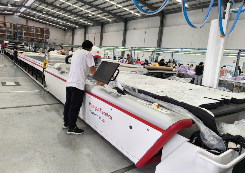 Automated fabric cutter in operation